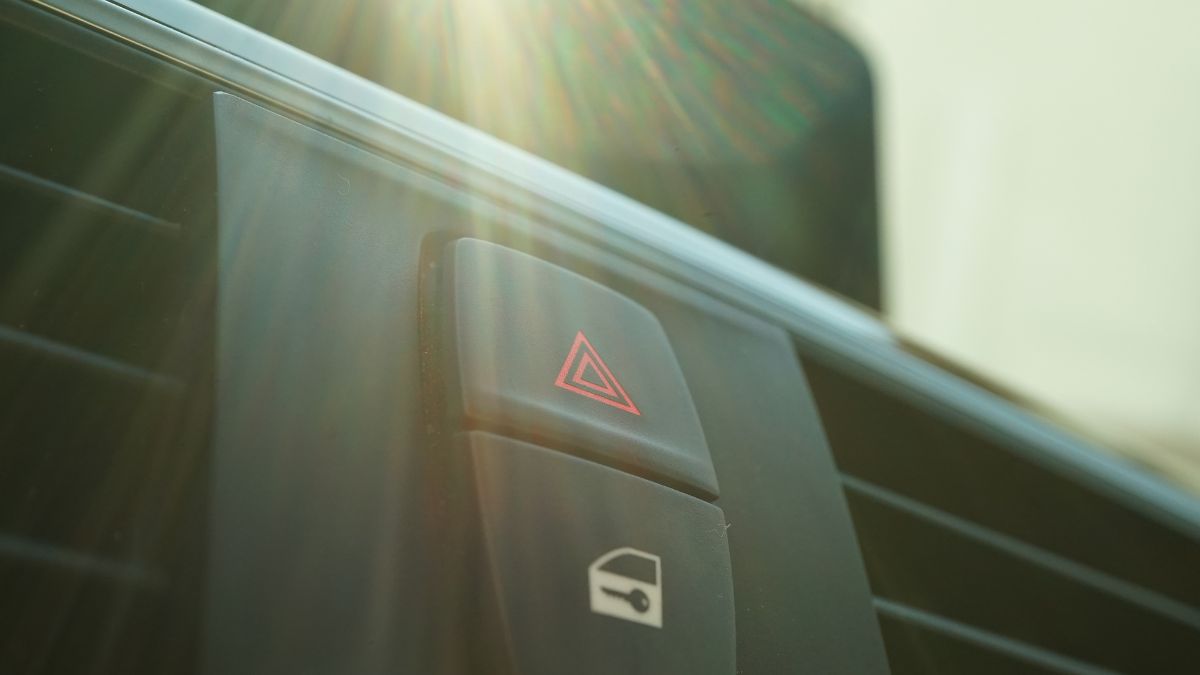 Button to put car hazards on