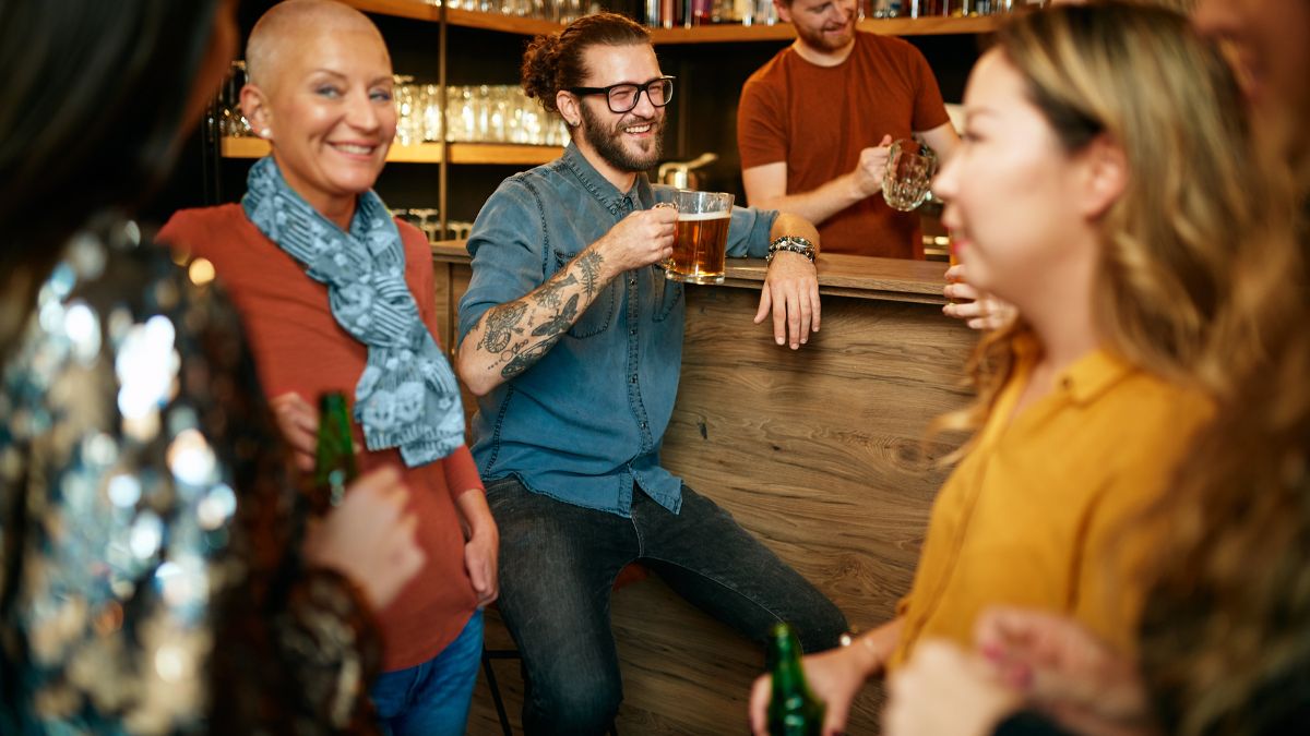 Group of people chatting while enjoying a drink