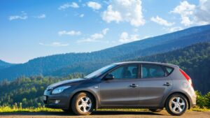 Rental car with mountains in the background