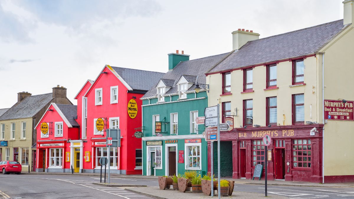 row of colorful accommodation buildings in Dingle, Ireland