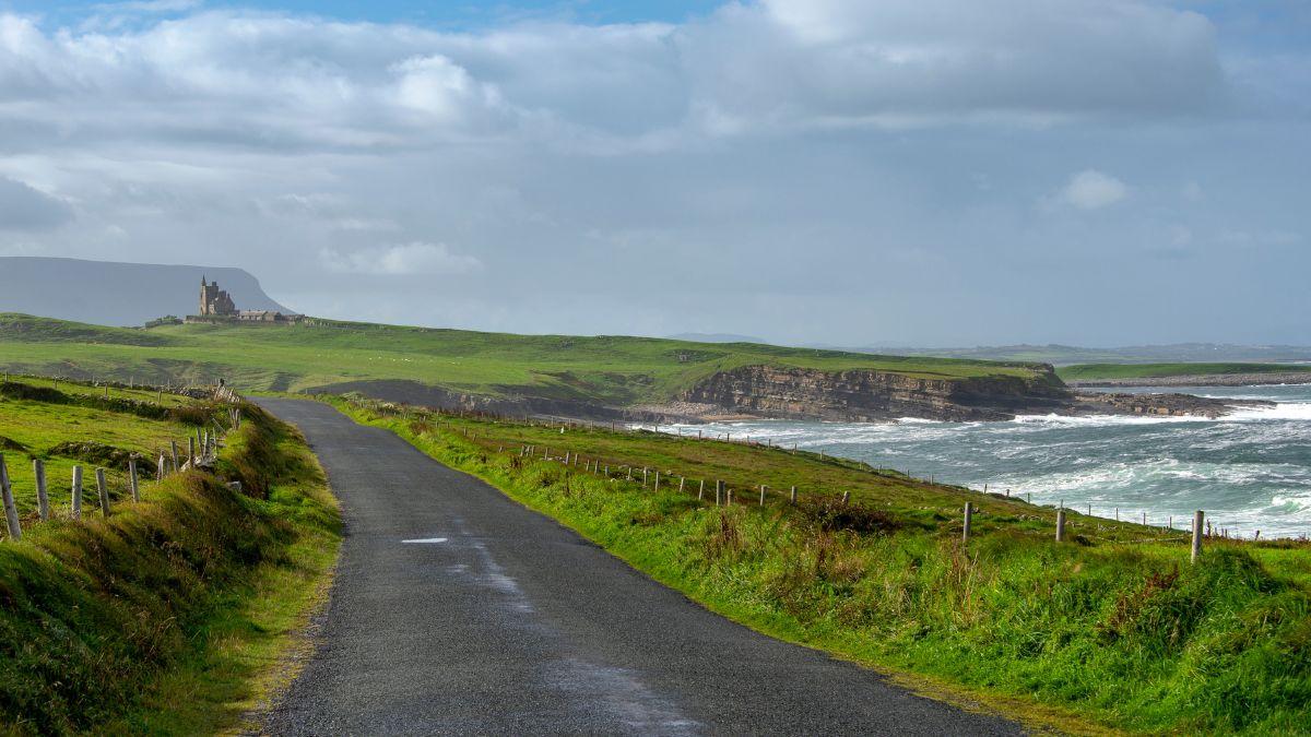 Wild Atlantic coastline at Mullaghmore Head, Ireland. Classiebawn Castle can be seen in the distance.