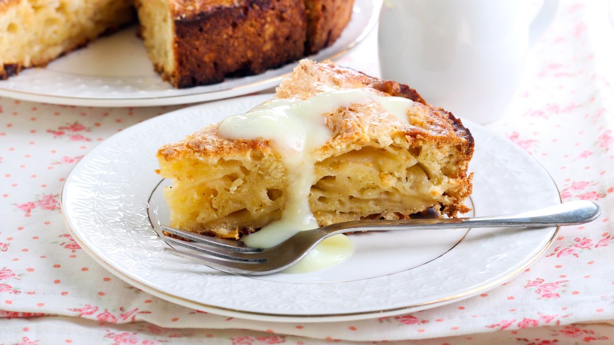 Slice of Irish apple cake served with custard
