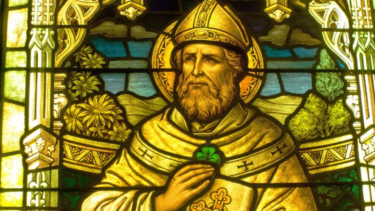 Detail of St Patrick with a shamrock in a stained glass window at the Smith Museum of Stained Glass Windows at Navy Pier in Chicago.