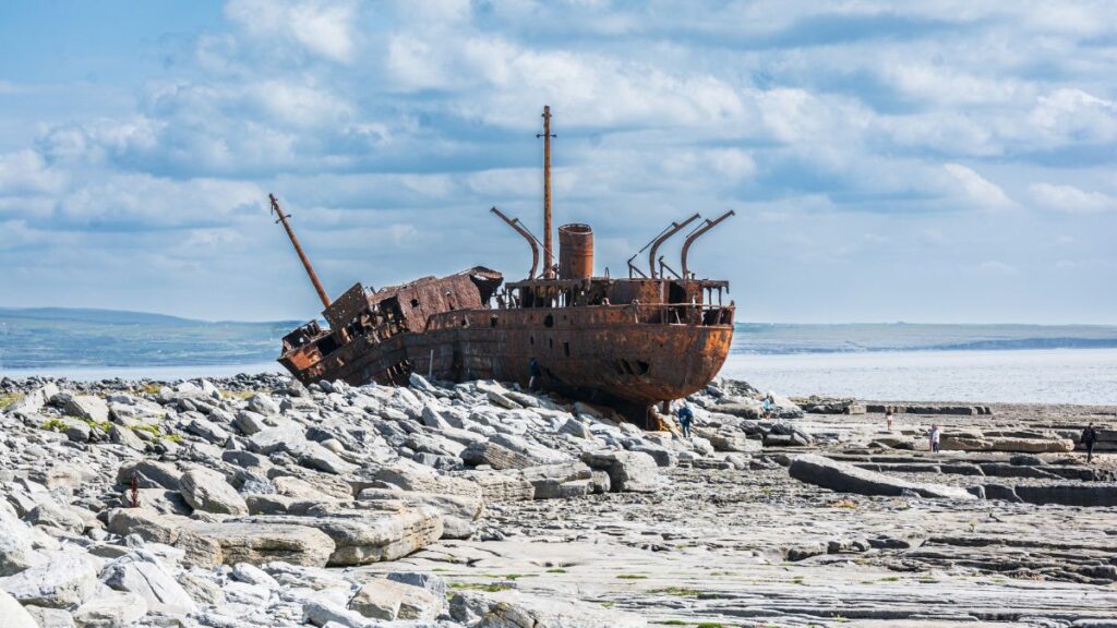 The rusting hulk of a decades old shipwreck on the shores of Inisheer (Inis Oirr) on the Aran Islands, Ireland.